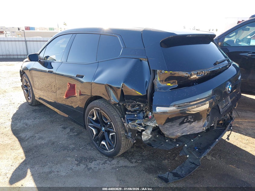 2025 BMW Ix VIN WB523CF03SCT07734 IAAI salvage auction — REAR END, Salvage (California), sold $12,600 on 2026-07-30 (photo 3)