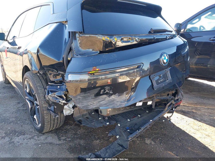 2025 BMW Ix VIN WB523CF03SCT07734 IAAI salvage auction — REAR END, Salvage (California), sold $12,600 on 2026-07-30 (photo 6)