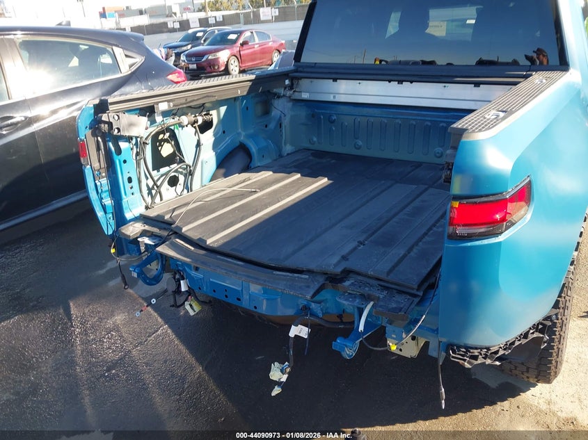 2022 Rivian R1t VIN 7FCTGAAA4NN010721 IAAI salvage auction — REAR END, Salvage (California), sold $18,500 on 2026-10-23 (photo 6)