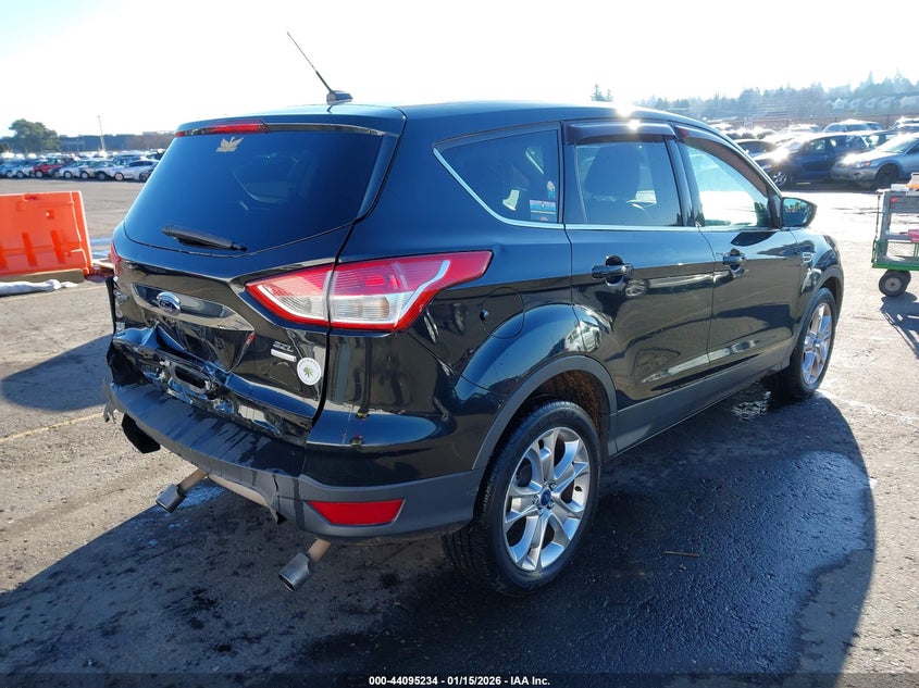 2013 Ford Escape VIN 1FMCU9H99DUA73354 IAAI salvage auction — REAR END, Salvage (Oregon), sold $1,250 on 2026-07-09 (photo 4)