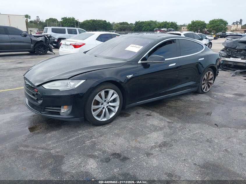 2013 Tesla Model s VIN 5YJSA1DN0DFP12081 IAAI salvage auction — FRONT & REAR, Rebuildable (Florida), sold $2,000 on 2026-07-30 (photo 2)