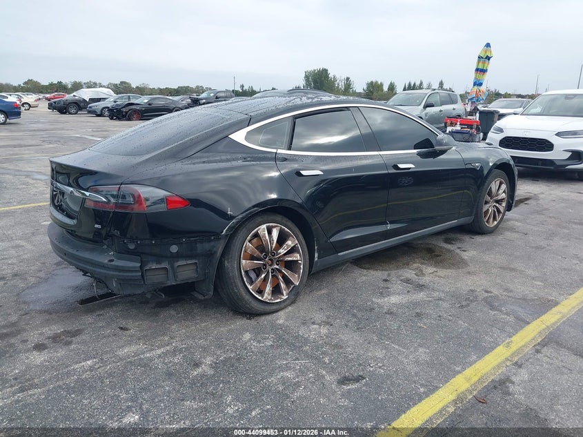2013 Tesla Model s VIN 5YJSA1DN0DFP12081 IAAI salvage auction — FRONT & REAR, Rebuildable (Florida), sold $2,000 on 2026-07-30 (photo 4)