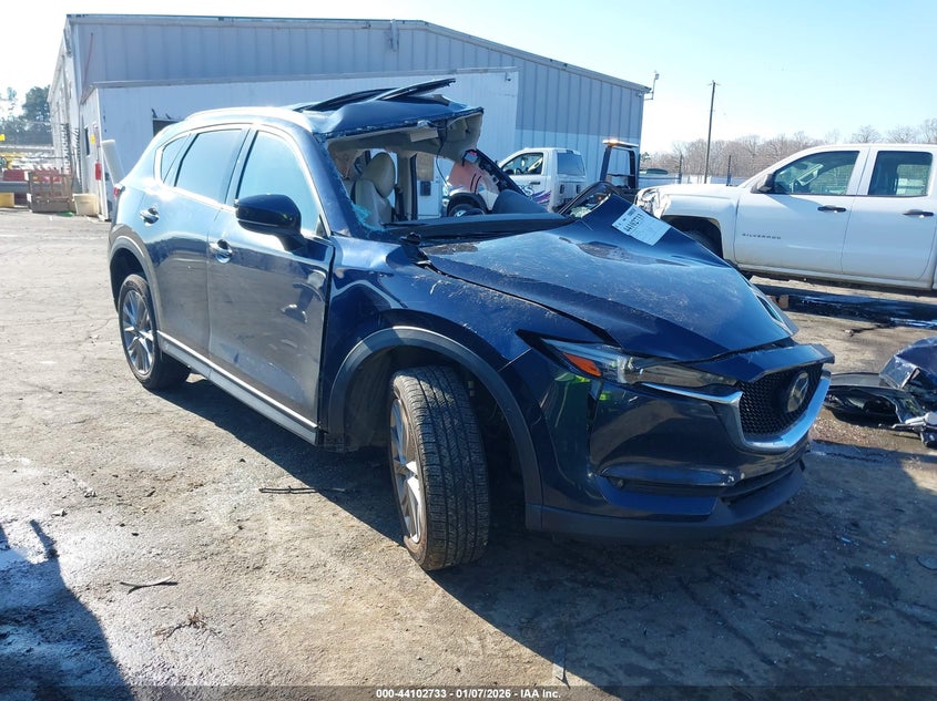 2021 Mazda Cx-5 VIN JM3KFADM1M0387004 IAAI salvage auction — SIDE, Salvage Title, sold $775 on 2026-07-23 (photo 1)