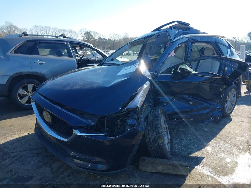 2021 Mazda Cx-5 VIN JM3KFADM1M0387004 IAAI salvage auction — SIDE, Salvage Title, sold $775 on 2026-07-23 (photo 2)