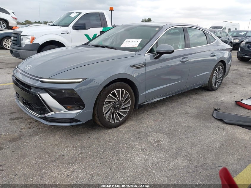 2025 Hyundai Sonata hybrid VIN KMHL34JJ5SA124888 IAAI salvage auction — SIDE, Other, sold $9,000 on 2026-07-30 (photo 2)