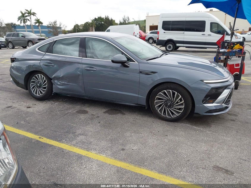 2025 Hyundai Sonata hybrid VIN KMHL34JJ5SA124888 IAAI salvage auction — SIDE, Other, sold $9,000 on 2026-07-30 (photo 6)