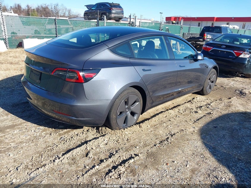 2023 Tesla Model 3 VIN 5YJ3E1EA5PF687865 IAAI salvage auction — REAR END, Clear (Maryland), sold $9,150 on 2026-07-16 (photo 4)