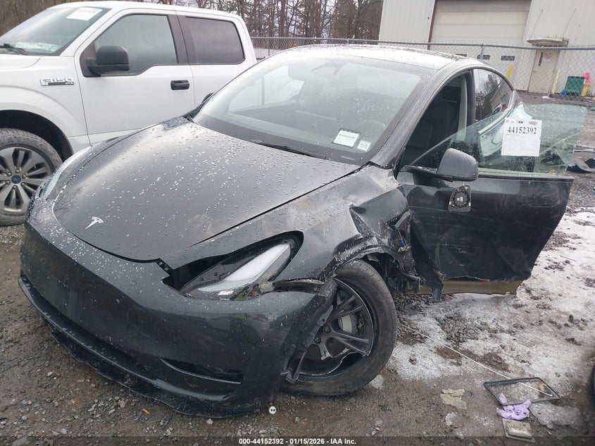 2025 Tesla Model y VIN 7SAYGDEEXSF288627 IAAI salvage auction — LEFT SIDE, Mv-907A (New York), sold $11,400 on 2026-07-09 (photo 2)