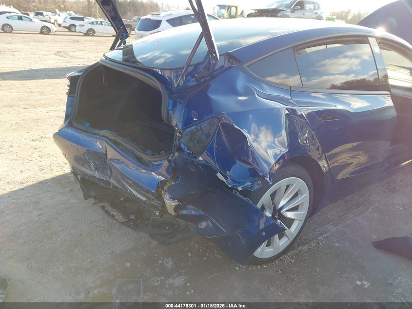 2022 Tesla Model 3 VIN 5YJ3E1EB7NF111507 IAAI salvage auction — REAR END, Salvage Title, sold $25 on 2026-07-30 (photo 6)