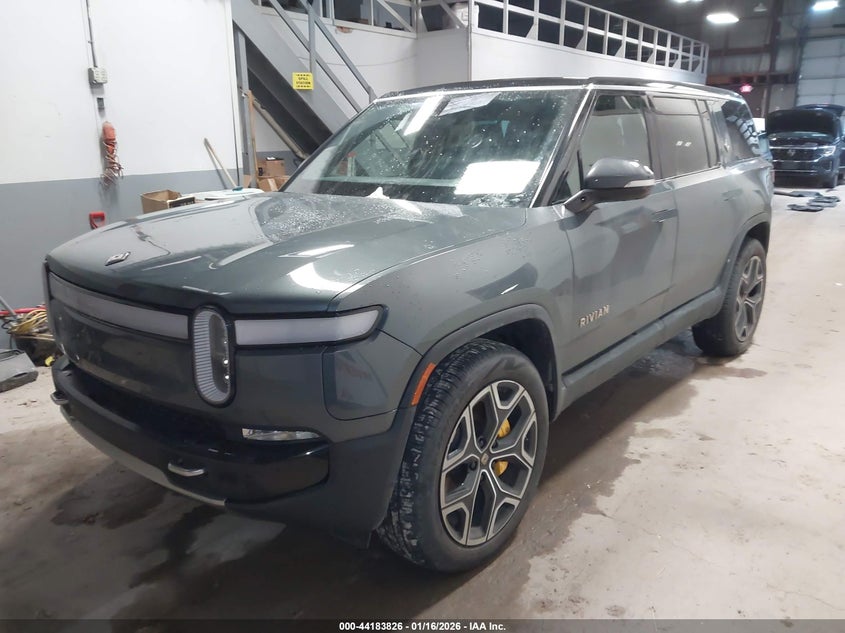 2023 Rivian R1s VIN 7PDSGABA1PN013944 IAAI salvage auction — SIDE, Salvage (Illinois), sold $21,100 on 2026-07-31 (photo 2)