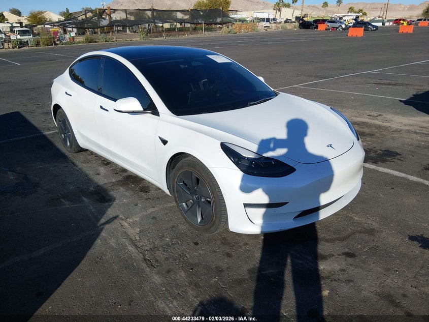 2022 Tesla Model 3 VIN 5YJ3E1EA8NF244624 — IAAI salvage auction photo