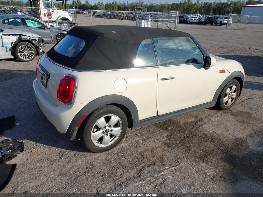2019 Mini Convertible VIN WMWWG5C59K3H08419 IAAI salvage auction — WATER/FLOOD, Rebuildable (Florida), sold $775 on 2026-07-29 (photo 4)