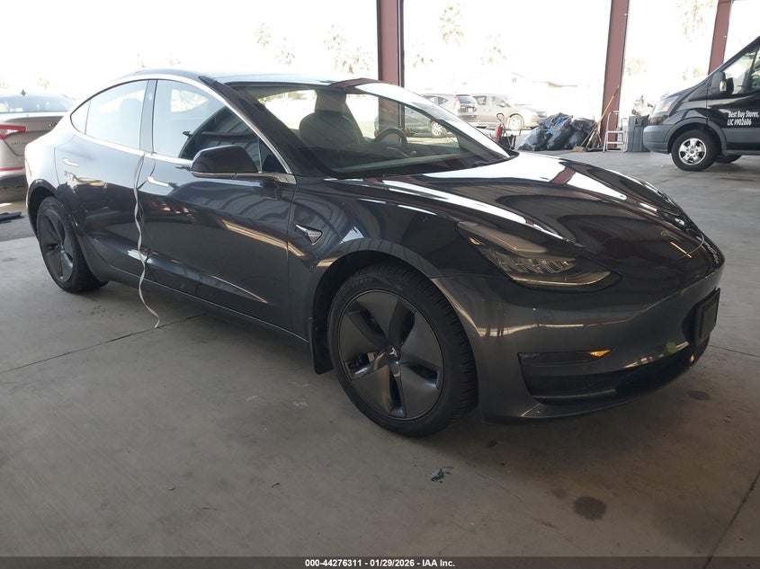 2018 Tesla Model 3 VIN 5YJ3E1EB5JF077206 IAAI salvage auction — FRAME DAMAGE, Salvage Title, sold $5,100 on 2026-07-28 (photo 1)