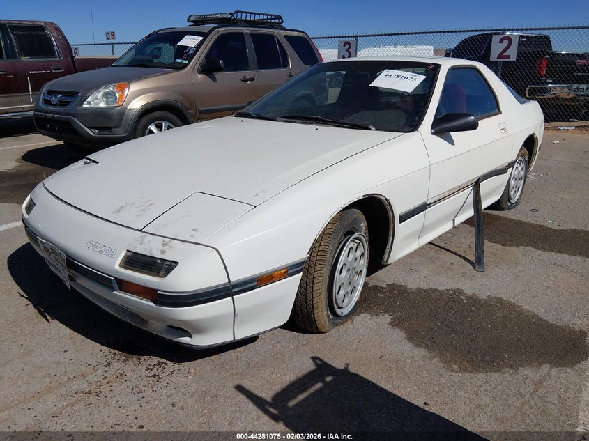 1986 Mazda Rx-7 VIN JM1FC3317G0147403 IAAI salvage auction — LEFT REAR, Clear (New Mexico), sold $75 on 2026-07-29 (photo 2)