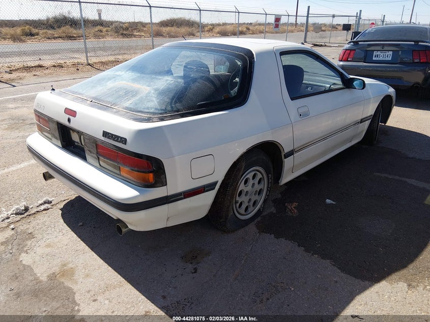 1986 Mazda Rx-7 VIN JM1FC3317G0147403 IAAI salvage auction — LEFT REAR, Clear (New Mexico), sold $75 on 2026-07-29 (photo 4)