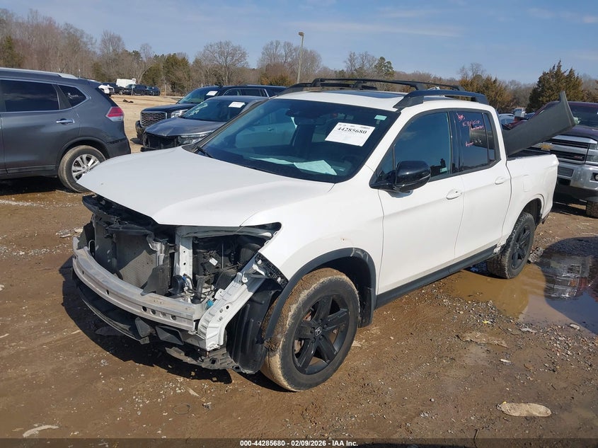 2023 Honda Ridgeline VIN 5FPYK3F86PB052652 IAAI salvage auction — FRONT & REAR, Unregisterable Title (Parts Only Title) (North Carolina), sold $5,150 on 2026-07-06 (photo 2)
