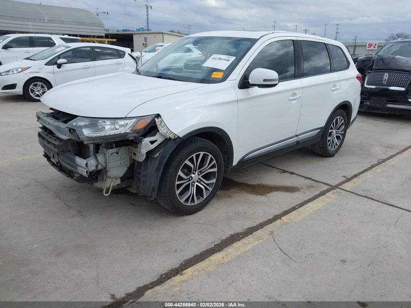 2017 Mitsubishi Outlander VIN JA4AD3A30HZ028840 IAAI salvage auction — SIDE, Salvage Title, sold $2,100 on 2026-08-24 (photo 2)