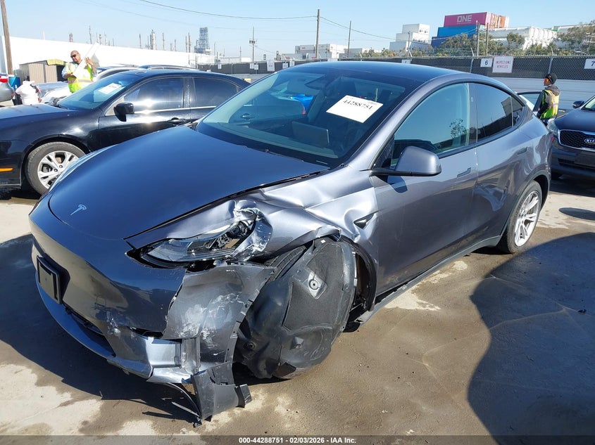 2023 Tesla Model y VIN 7SAYGDEE3PF866008 IAAI salvage auction — LEFT FRONT, Salvage (California), sold $11,300 on 2026-07-22 (photo 2)