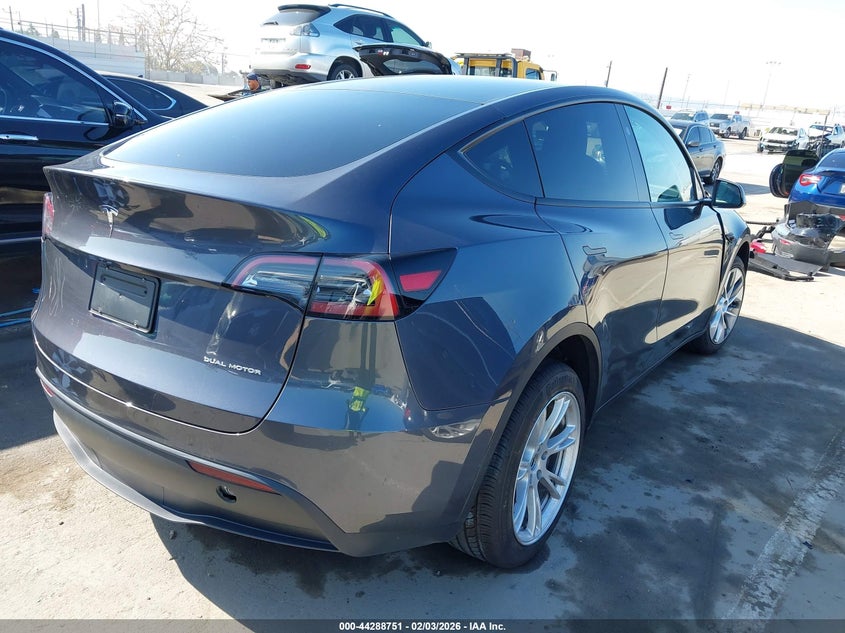 2023 Tesla Model y VIN 7SAYGDEE3PF866008 IAAI salvage auction — LEFT FRONT, Salvage (California), sold $11,300 on 2026-07-22 (photo 4)