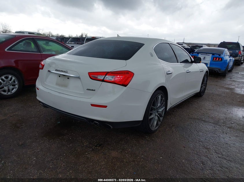 2014 Maserati Ghibli VIN ZAM57XSA4E1090279 IAAI salvage auction — FRONT & REAR, Salvage Title, sold $3,800 on 2026-07-22 (photo 4)