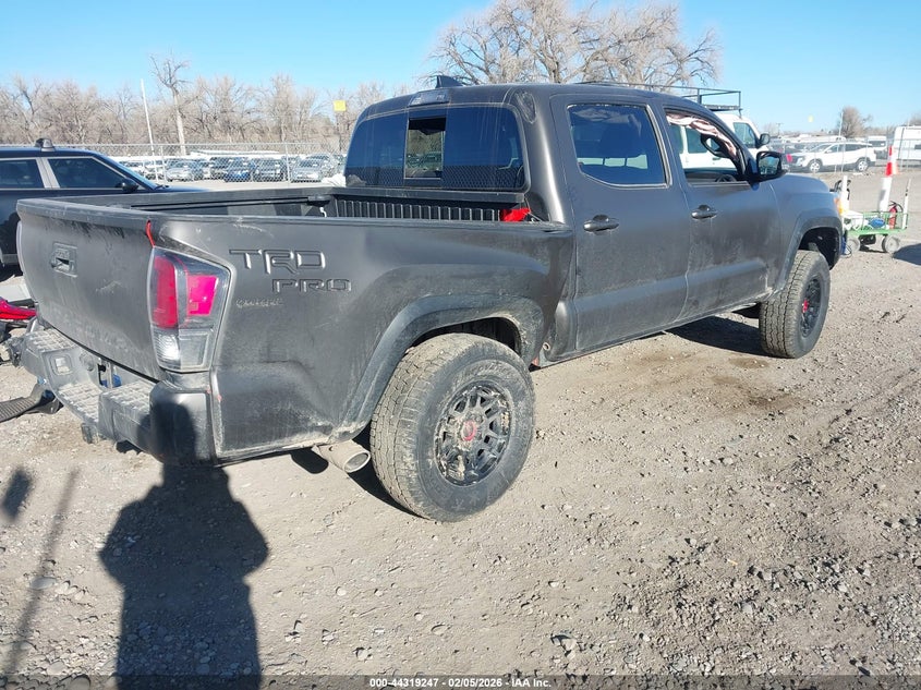 2023 Toyota Tacoma VIN 3TYCZ5AN4PT113195 IAAI salvage auction — Rollover, Salvage (Montana), sold $13,750 on 2026-04-01 (photo 4)