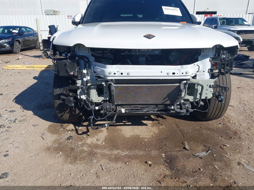 2025 Rivian R1s VIN 7PDSGCBPXSN057904 IAAI salvage auction — FRONT END, Original (Texas), sold $35,200 on 2026-07-09 (photo 6)
