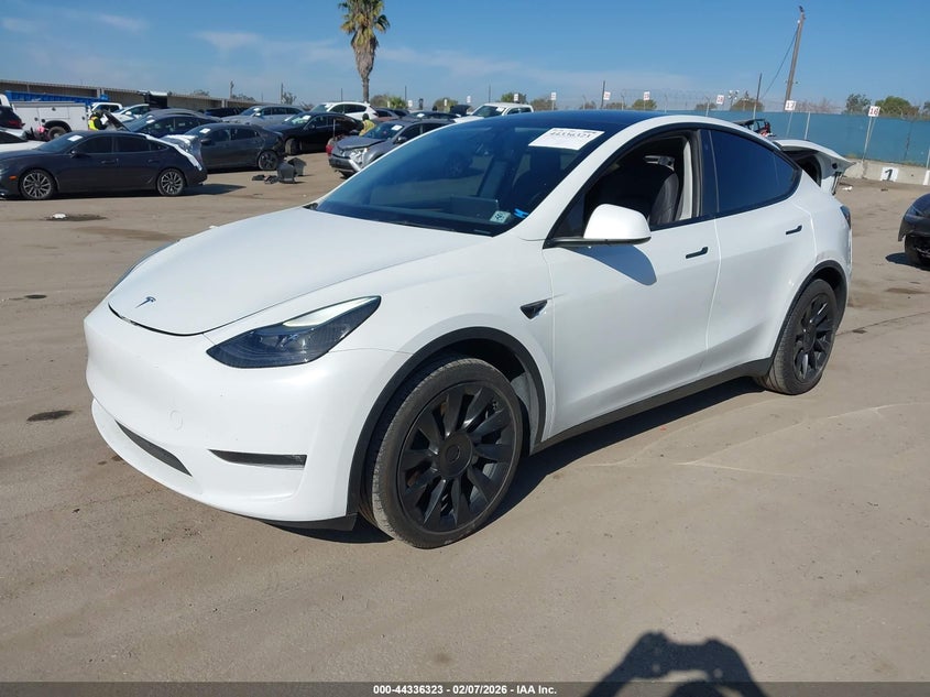 2023 Tesla Model y VIN 7SAYGDEE0PF632473 IAAI salvage auction — REAR END, Salvage (California), sold $7,600 on 2026-07-30 (photo 2)