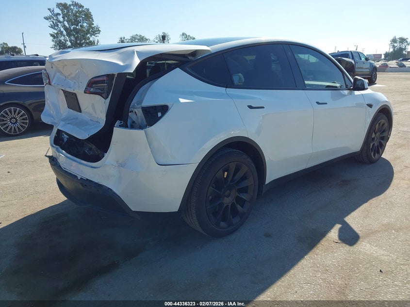 2023 Tesla Model y VIN 7SAYGDEE0PF632473 IAAI salvage auction — REAR END, Salvage (California), sold $7,600 on 2026-07-30 (photo 4)