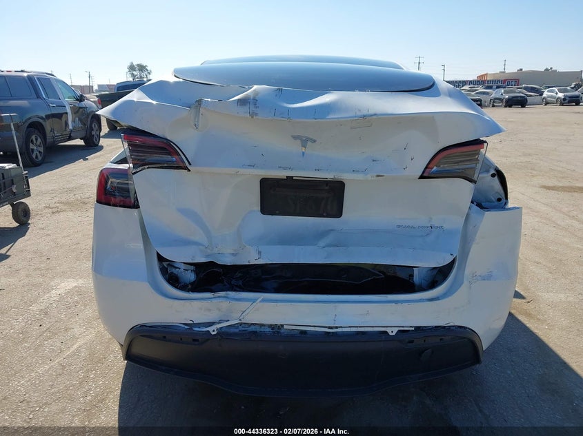 2023 Tesla Model y VIN 7SAYGDEE0PF632473 IAAI salvage auction — REAR END, Salvage (California), sold $7,600 on 2026-07-30 (photo 6)