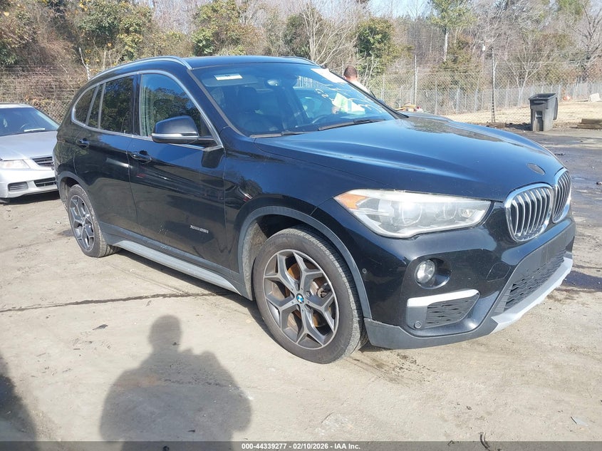2017 BMW X1 VIN WBXHT3C34H5F83145 IAAI salvage auction — REAR END, Salvage Title, sold $25 on 2026-07-23 (photo 1)