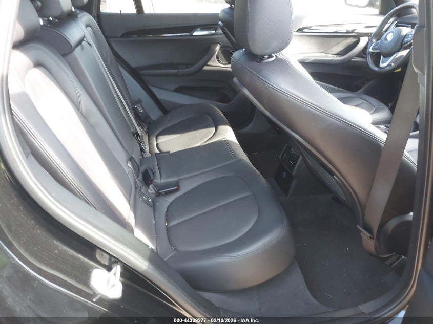 2017 BMW X1 VIN WBXHT3C34H5F83145 IAAI salvage auction — REAR END, Salvage Title, sold $25 on 2026-07-23 (photo 8)