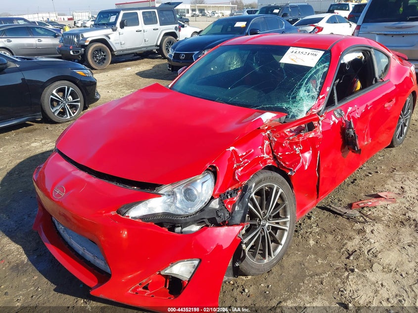 2014 Scion Fr-s VIN JF1ZNAA15E8704070 IAAI salvage auction — SIDE, Salvage Title, sold $600 on 2026-07-11 (photo 6)