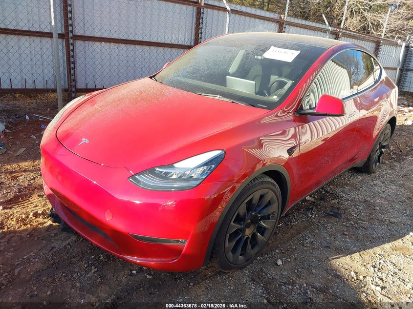 2023 Tesla Model y VIN 7SAYGDEE0PA051603 IAAI salvage auction — SIDE, Clear (Oklahoma), sold $14,300 on 2026-08-22 (photo 2)
