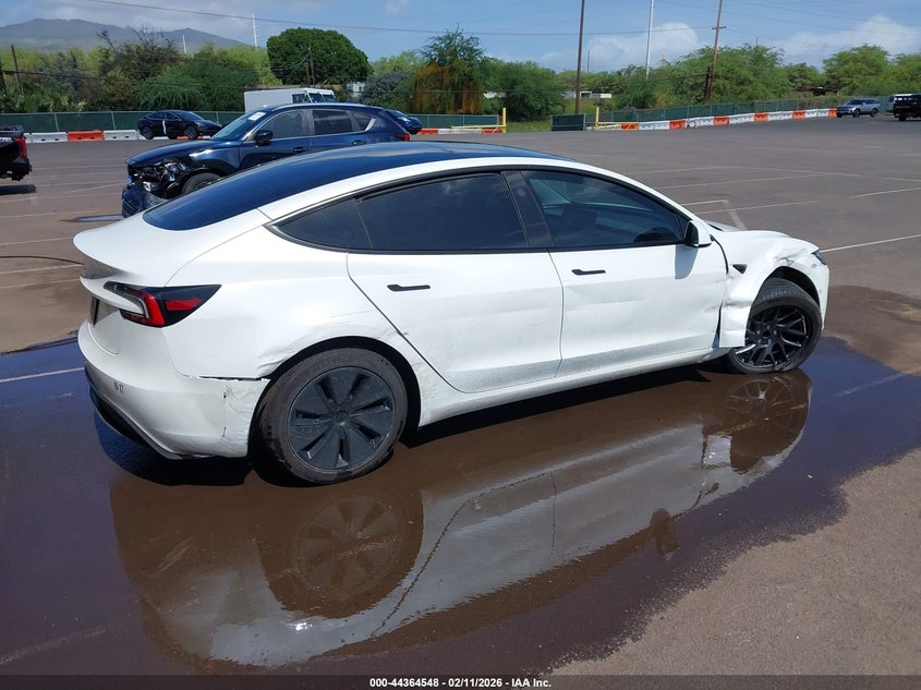 2025 Tesla Model 3 VIN 5YJ3E1EA0SF981943 IAAI salvage auction — RIGHT FRONT, Salvage (Hawaii), sold $12,900 on 2026-08-25 (photo 4)