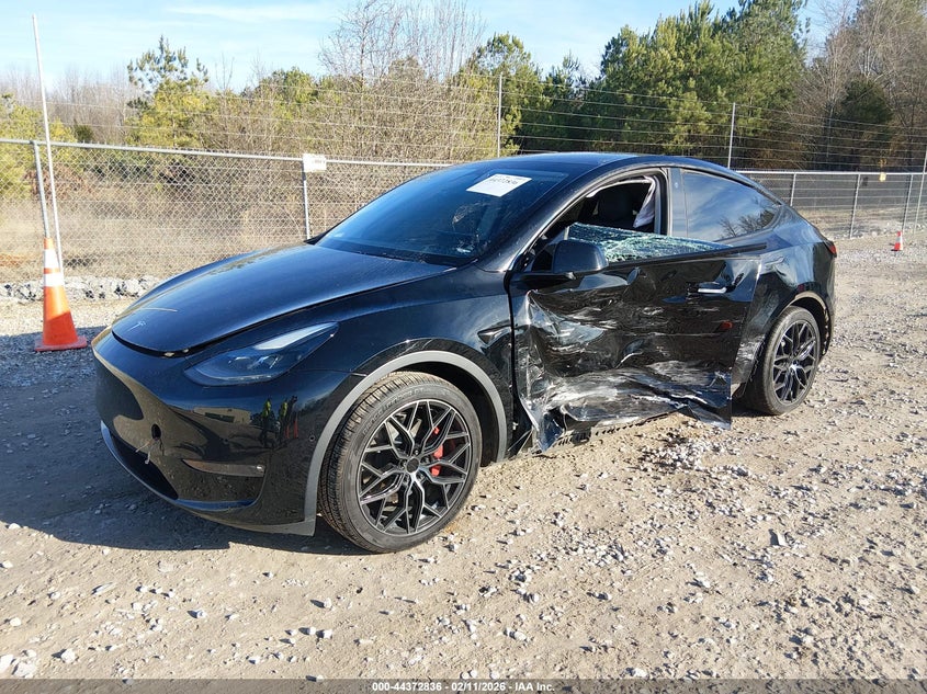 2022 Tesla Model y VIN 7SAYGAEE4NF515913 IAAI salvage auction — LEFT SIDE, Salvage (Alabama), sold $6,900 on 2026-07-13 (photo 2)