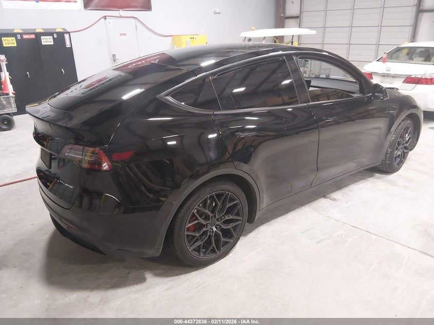 2022 Tesla Model y VIN 7SAYGAEE4NF515913 IAAI salvage auction — LEFT SIDE, Salvage (Alabama), sold $6,900 on 2026-07-13 (photo 4)