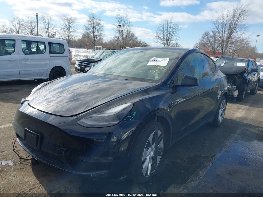 2023 Tesla Model y VIN 7SAYGAEE4PF829385 IAAI salvage auction — FRONT & REAR, Salvage (New Jersey), sold $8,500 on 2026-07-16 (photo 2)