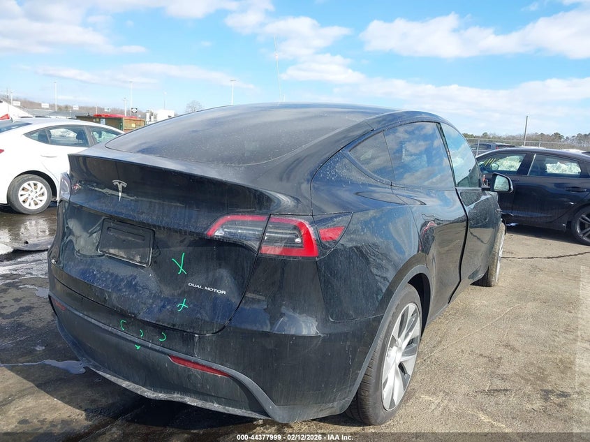 2023 Tesla Model y VIN 7SAYGAEE4PF829385 IAAI salvage auction — FRONT & REAR, Salvage (New Jersey), sold $8,500 on 2026-07-16 (photo 4)