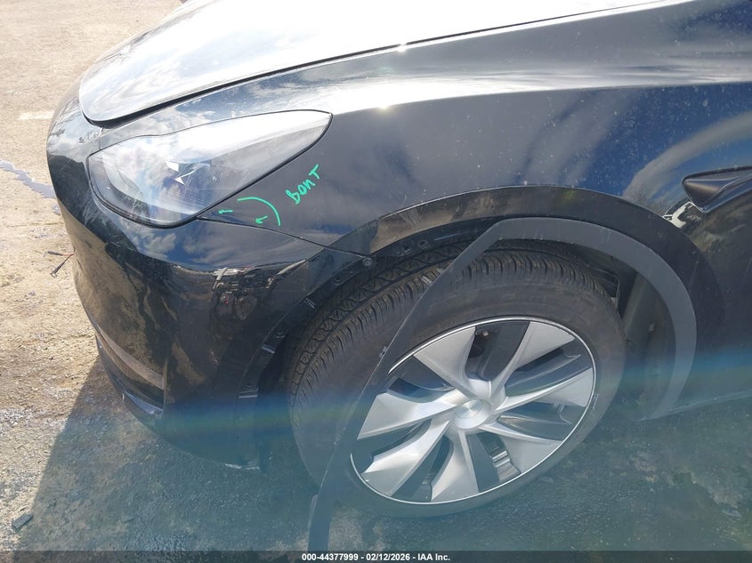 2023 Tesla Model y VIN 7SAYGAEE4PF829385 IAAI salvage auction — FRONT & REAR, Salvage (New Jersey), sold $8,500 on 2026-07-16 (photo 6)