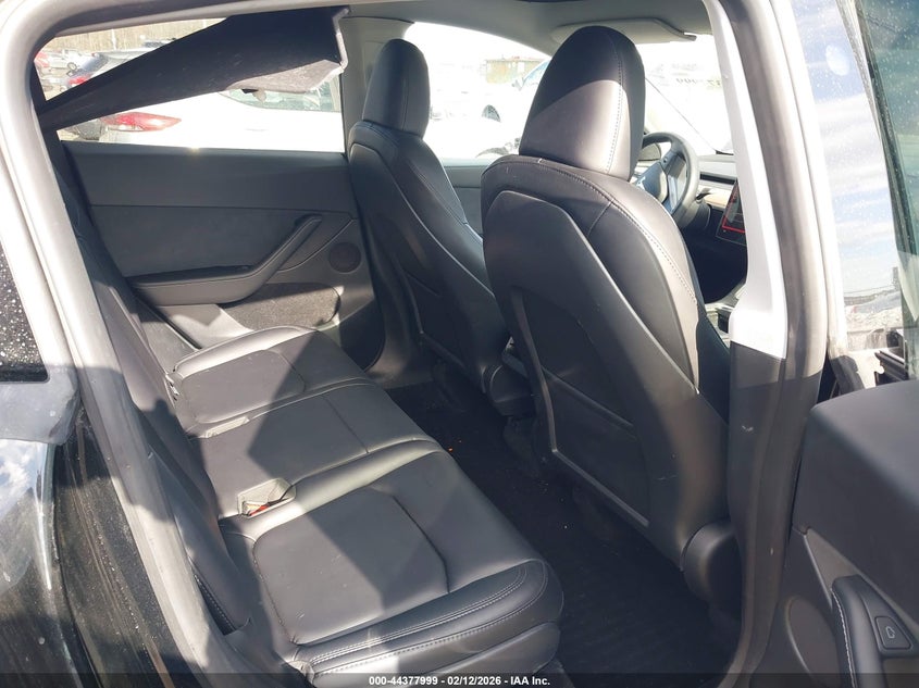 2023 Tesla Model y VIN 7SAYGAEE4PF829385 IAAI salvage auction — FRONT & REAR, Salvage (New Jersey), sold $8,500 on 2026-07-16 (photo 8)