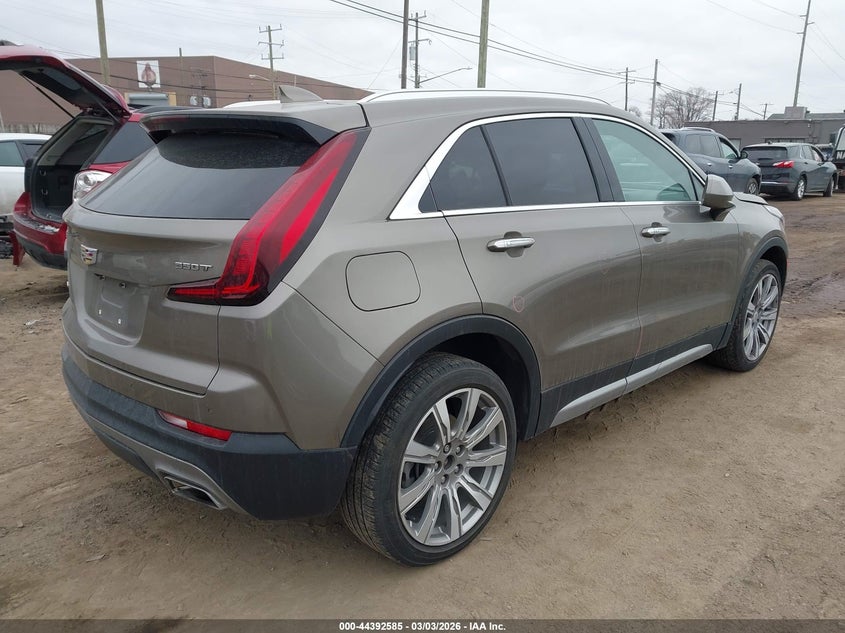 2020 Cadillac Xt4 VIN 1GYFZDR41LF046008 IAAI salvage auction — SIDE, Salvage Title, sold $7,350 on 2026-08-13 (photo 4)