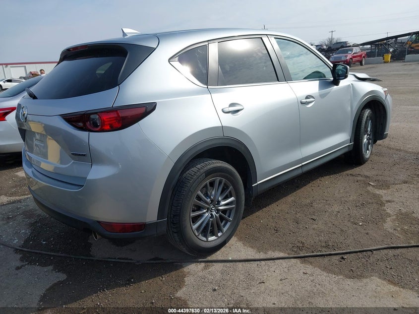 2021 Mazda Cx-5 VIN JM3KFACM4M0340311 IAAI salvage auction — SIDE, Clear (Oklahoma), sold $3,350 on 2026-07-31 (photo 4)