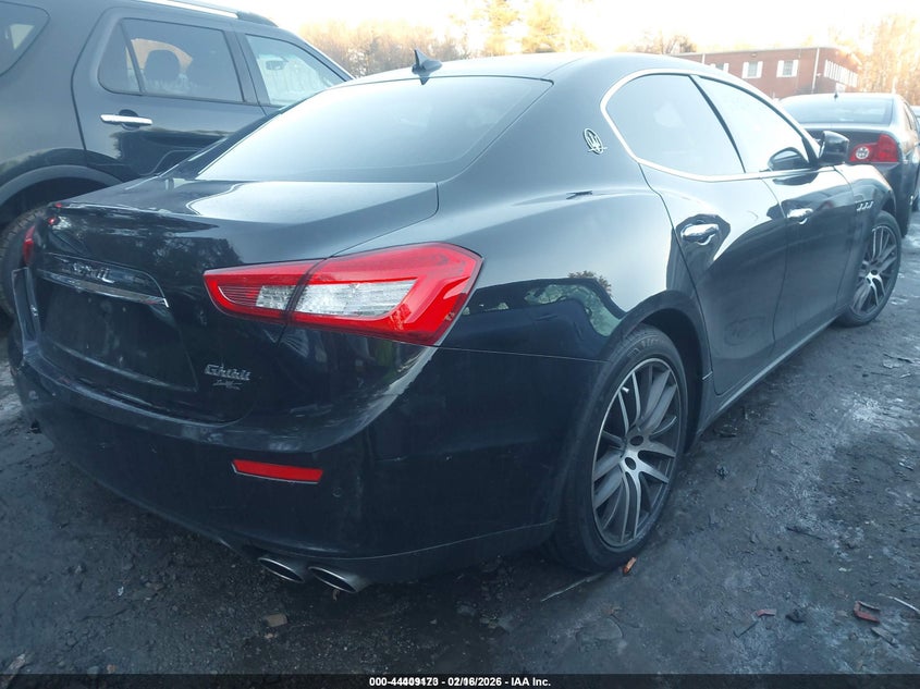 2017 Maserati Ghibli VIN ZAM57RTA3H1228960 IAAI salvage auction — LEFT REAR, Salvage (Massachusetts), sold $4,800 on 2026-08-11 (photo 4)