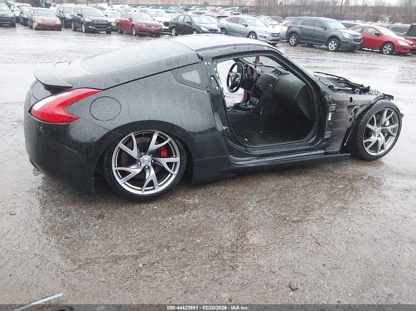 2014 Nissan 370z VIN JN1AZ4EH8EM637124 IAAI salvage auction — ALL OVER, Salvage Title, sold $975 on 2026-07-24 (photo 4)