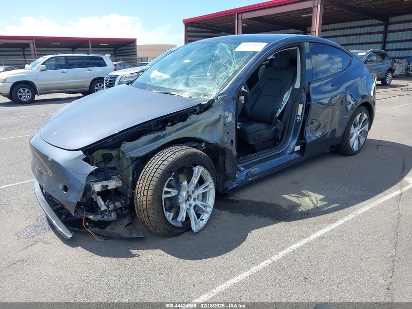 2022 Tesla Model y VIN 7SAYGDEE1NF454652 IAAI salvage auction — LEFT SIDE, Salvage (Hawaii), sold $2,050 on 2026-07-21 (photo 2)