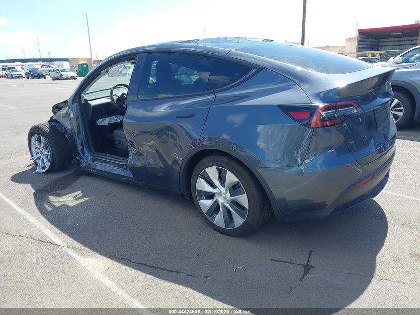 2022 Tesla Model y VIN 7SAYGDEE1NF454652 IAAI salvage auction — LEFT SIDE, Salvage (Hawaii), sold $2,050 on 2026-07-21 (photo 3)