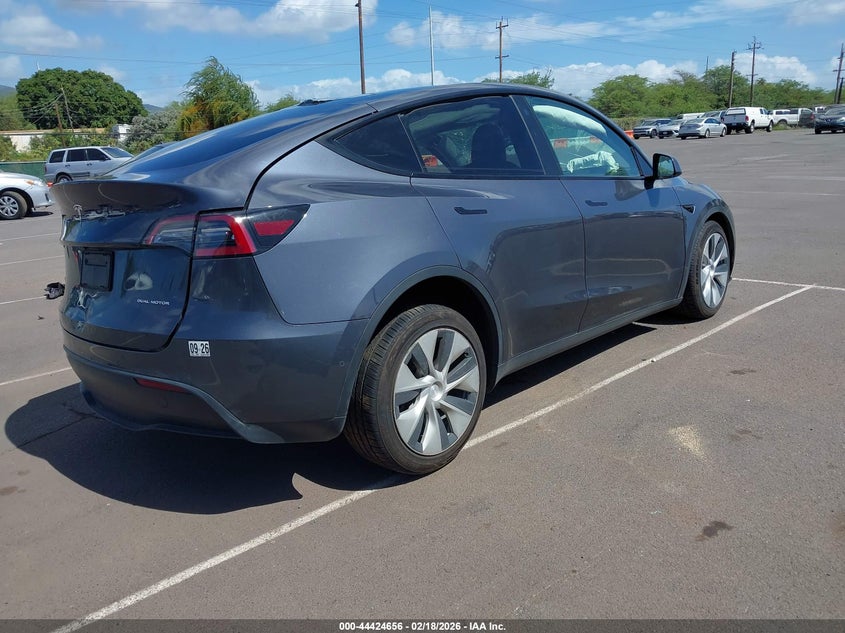 2022 Tesla Model y VIN 7SAYGDEE1NF454652 IAAI salvage auction — LEFT SIDE, Salvage (Hawaii), sold $2,050 on 2026-07-21 (photo 4)