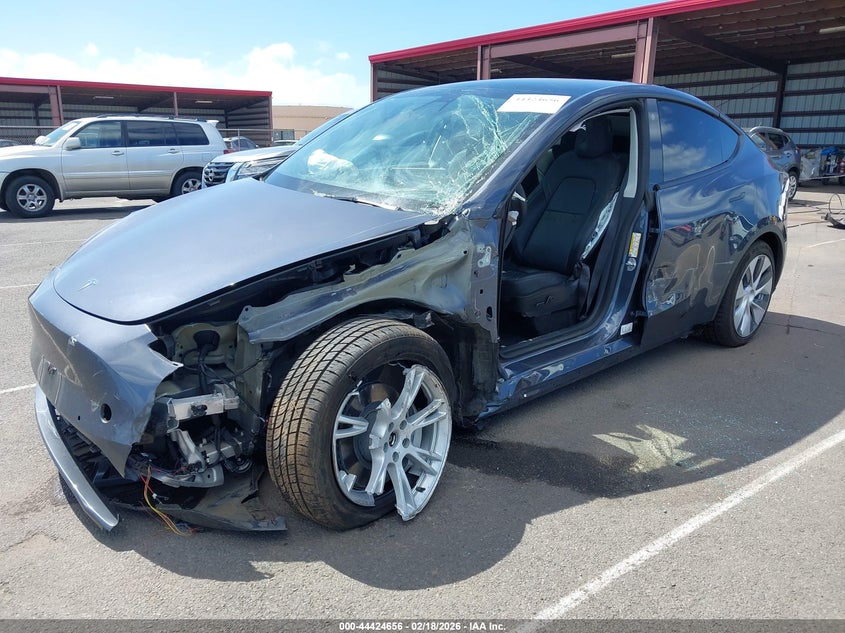 2022 Tesla Model y VIN 7SAYGDEE1NF454652 IAAI salvage auction — LEFT SIDE, Salvage (Hawaii), sold $2,050 on 2026-07-21 (photo 6)