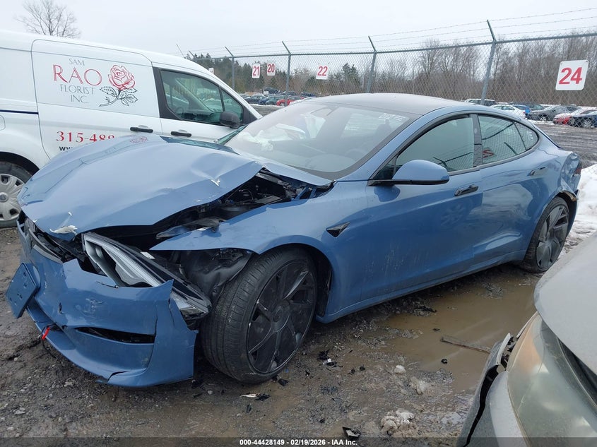 2026 Tesla Model s VIN 5YJSA1E57TF555923 IAAI salvage auction — ALL OVER, Salvage Title (New York), sold $13,100 on 2026-07-30 (photo 2)