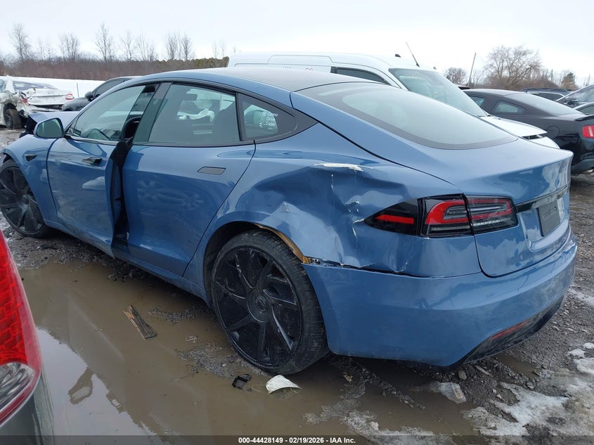 2026 Tesla Model s VIN 5YJSA1E57TF555923 IAAI salvage auction — ALL OVER, Salvage Title (New York), sold $13,100 on 2026-07-30 (photo 3)